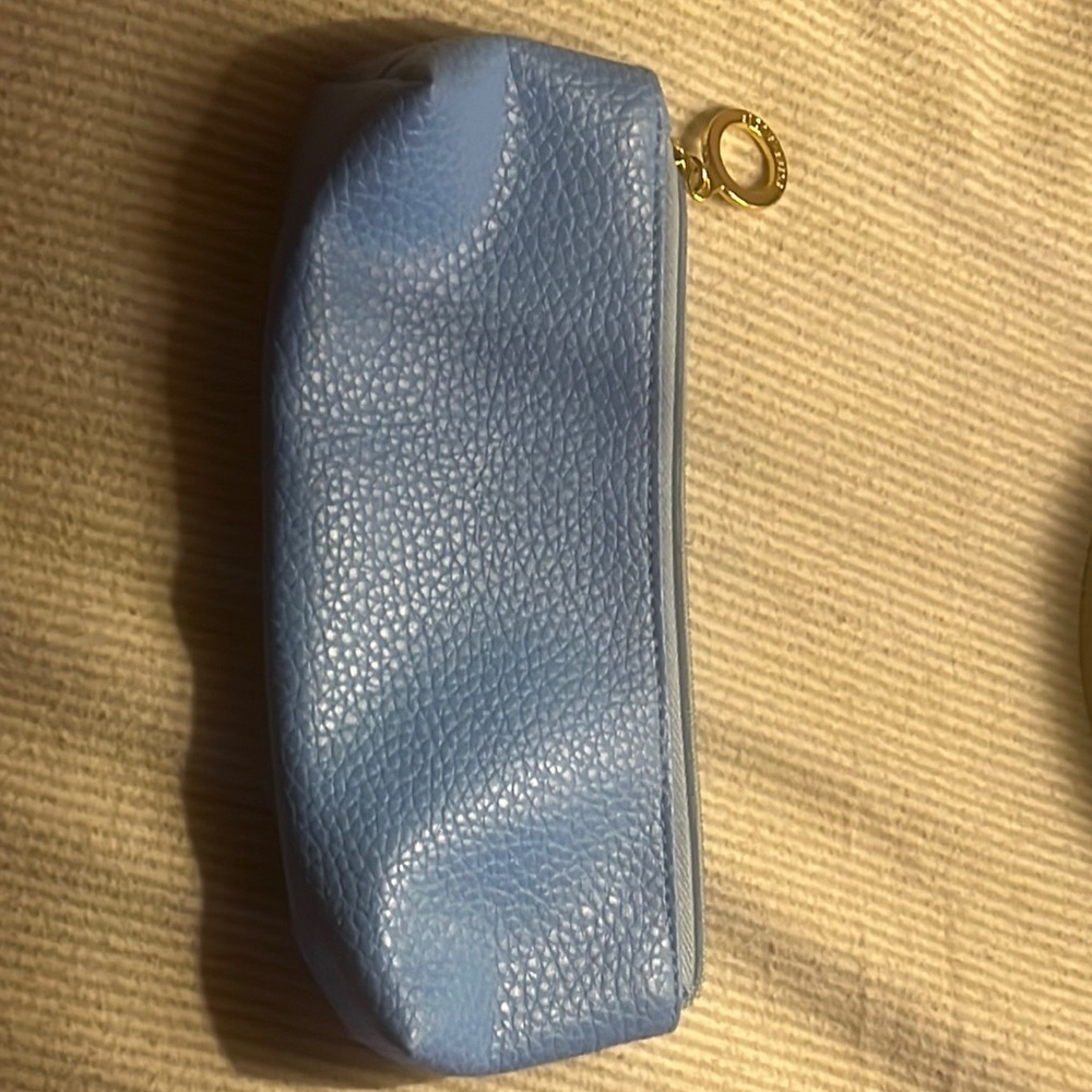 Small Blue Bag. No pockets. One zipper.